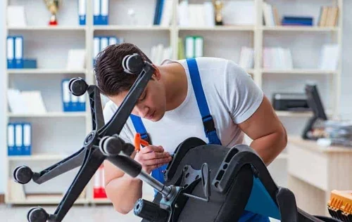 Man Repairing Office Chair