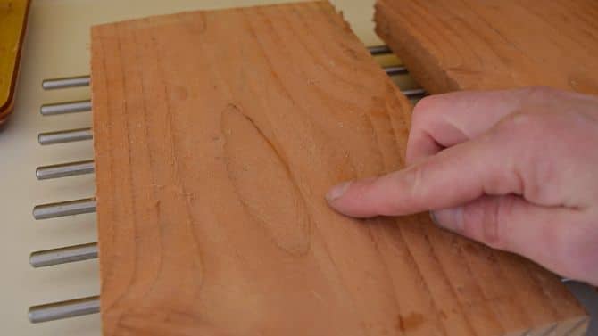  person using a wooden board to create another wooden board