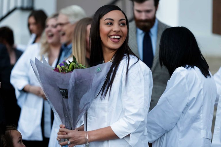 do you bring flowers to a white coat ceremony