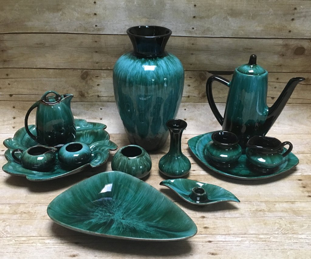 an ocean green colored pot and cups